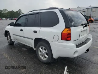 2008 GMC Envoy SLE2 with VIN 1GKDT13S482138883, listed as a Copart auction lot 60243614 with 232,037 mi miles and Salvage Title. Bid and sale history available at DreamBid. Image 2.