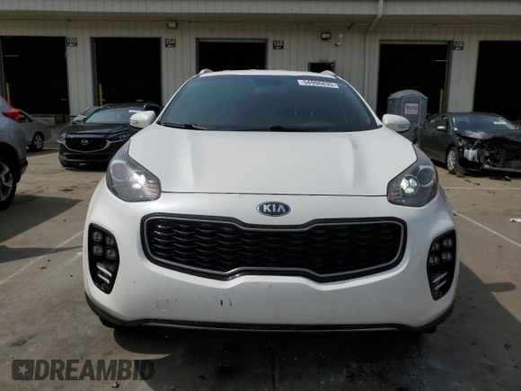 2019 Kia Sportage EX z VIN KNDPNCAC7K7522953, wystawiony jako Copart lot #54906835 z przebiegiem 128 011 mil mil oraz Szkoda całkowita • Salvage title. Historia ofert i sprzedaży dostępna na DreamBid. Obrazek 5.