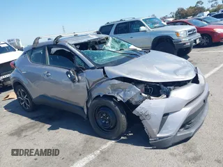 2019 Toyota C-HR XLE with VIN JTNKHMBX8K1046347, listed as a IAAI auction lot 42140743 with 49,918 mi miles. Bid and sale history available at carsss.com. Image 1.