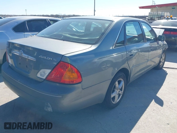 2002 Toyota Avalon XL with VIN 4T1BF28B22U264899, listed as a IAAI auction lot 41731728 with 122,004 mi miles and . Bid and sale history available at DreamBid. Image 4.