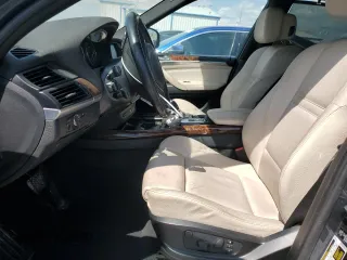 2013 BMW X5 xDrive35i z VIN 5UXZV4C54D0B14923, wystawiony jako Copart lot #50929385 z przebiegiem 249 533 mil mil oraz Tytuł czysty. Historia ofert i sprzedaży dostępna na DreamBid. Obrazek 7.