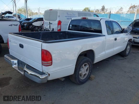 1997 Dodge Dakota with VIN 1B7GL23X2VS239975, listed as a IAAI auction lot 41831896 with 382,978 mi miles. Bid and sale history available at carsss.com. Image 4.