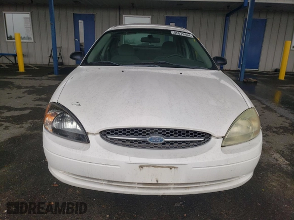 2003 Ford Taurus LX Standard with VIN 1FAFP52U53G280700, listed as a Copart auction lot 87488014 with 128,020 mi miles and Salvage title. Bid and sale history available at DreamBid. Image 5.