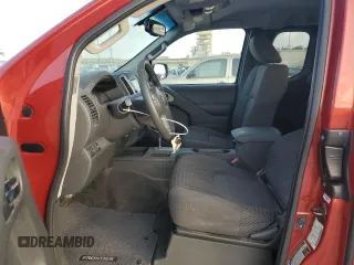 2015 Nissan Frontier SV with VIN 1N6AD0CUXFN766687, listed as a Copart auction lot 57445095 with 65,525 mi miles and Salvage title. Bid and sale history available at DreamBid. Image 7.