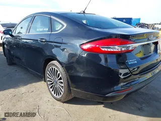 2017 Ford Fusion Energi SE with VIN 3FA6P0PU7HR373391, listed as a IAAI auction lot 41677525 with 99,499 mi miles. Bid and sale history available at carsss.com. Image 3.