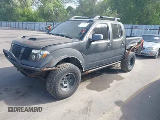 2006 Nissan Frontier LE with VIN 1N6AD07W86C462328, listed as a IAAI auction lot 42520003 with 186,231 mi miles and . Bid and sale history available at DreamBid. Image 2.