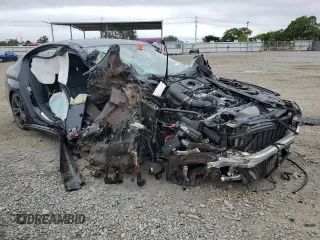 2019 BMW 5 Series M550i xDrive with VIN WBAJB9C53KB464298, listed as a Copart auction lot 59892105 with Not provided miles and Salvage title. Bid and sale history available at DreamBid. Image 4.