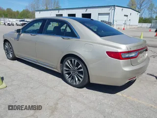 2017 Lincoln Continental Reserve z VIN 1LN6L9NP9H5616821, wystawiony jako IAAI lot #42217250 z przebiegiem 88 138 mil mil oraz . Historia ofert i sprzedaży dostępna na DreamBid. Obrazek 3.