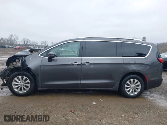 2021 Chrysler Pacifica Touring L with VIN 2C4RC1BG7MR584956, listed as a IAAI auction lot 42016887 with 51,415 mi miles and . Bid and sale history available at DreamBid. Image 15.