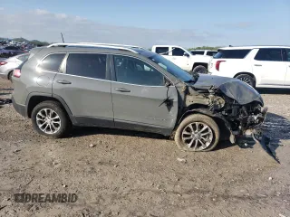 2020 Jeep Cherokee Latitude Plus with VIN 1C4PJLLBXLD581207, listed as a Copart auction lot 52283645 with 129,742 mi miles and Salvage Title. Bid and sale history available at carsss.com. Image 4.