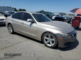 2013 BMW 3 Series 328i with VIN WBA3A5C5XDF603603, listed as a Copart auction lot 62201485 with 153,312 mi miles and Salvage title. Bid and sale history available at DreamBid. Image 4.