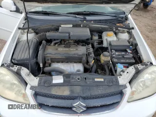 2006 Suzuki Forenza z VIN KL5JD56Z86K350488, wystawiony jako Copart lot #67422784 z przebiegiem 125 251 mil mil oraz Tytuł czysty. Historia ofert i sprzedaży dostępna na DreamBid. Obrazek 11.