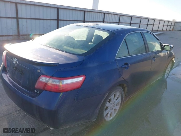 2007 Toyota Camry CE with VIN JTNBE46K573024650, listed as a IAAI auction lot 41758246 with 246,501 mi miles. Bid and sale history available at carsss.com. Image 4.