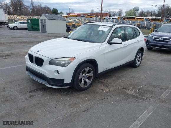 2015 BMW X1 sDrive28i with VIN WBAVM1C50FV314957, listed as a IAAI auction lot 41816402 with 148,410 mi miles. Bid and sale history available at carsss.com. Image 2.