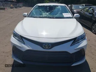 2023 Toyota Camry LE z VIN 4T1C11AK0PU145781, wystawiony jako IAAI lot #42404456 z przebiegiem 53 657 mil mil oraz . Historia ofert i sprzedaży dostępna na DreamBid. Obrazek 12.