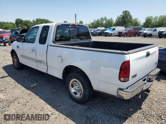 2002 Ford F-150 XL with VIN 1FTRX17L42NB56461, listed as a Copart auction lot 59988885 with 244,057 mi miles and Clean title. Bid and sale history available at DreamBid. Image 2.