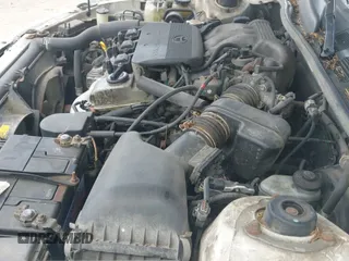 1998 Toyota Camry LE z VIN 4T1BF28K7WU070231, wystawiony jako IAAI lot #42650252 z przebiegiem 258 405 mil mil oraz . Historia ofert i sprzedaży dostępna na DreamBid. Obrazek 12.