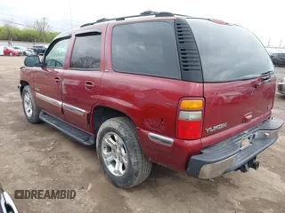 2001 GMC Yukon SLT with VIN 1GKEK13T71J198393, listed as a IAAI auction lot 41898293 with 230,055 mi miles. Bid and sale history available at carsss.com. Image 3.