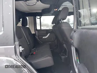 2016 Jeep Wrangler Unlimited Rubicon with VIN 1C4BJWFG7GL192698, listed as a IAAI auction lot 41603236 with 69,620 mi miles. Bid and sale history available at carsss.com. Image 8.