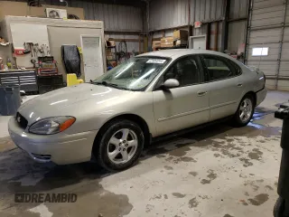 2004 Ford Taurus SE with VIN 1FAFP53U74G122231, listed as a Copart auction lot 42904044 with 116,851 mi miles and Salvage Title. Bid and sale history available at DreamBid. Image 1.