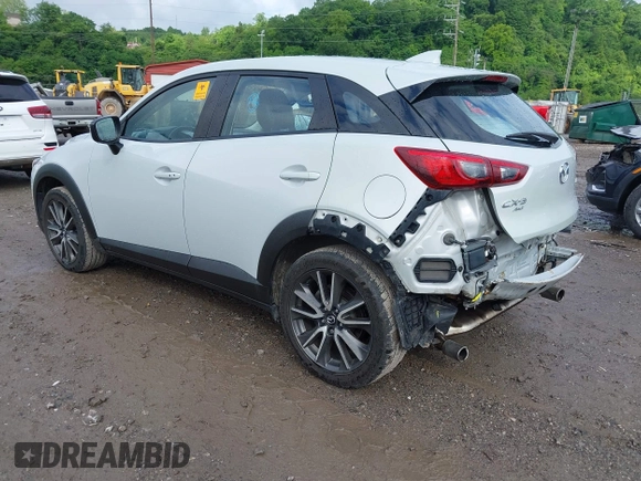 2017 Mazda CX-3 Touring z VIN JM1DKFC7XH0141919, wystawiony jako IAAI lot #42333679 z przebiegiem 93 234 mil mil oraz . Historia ofert i sprzedaży dostępna na DreamBid. Obrazek 3.