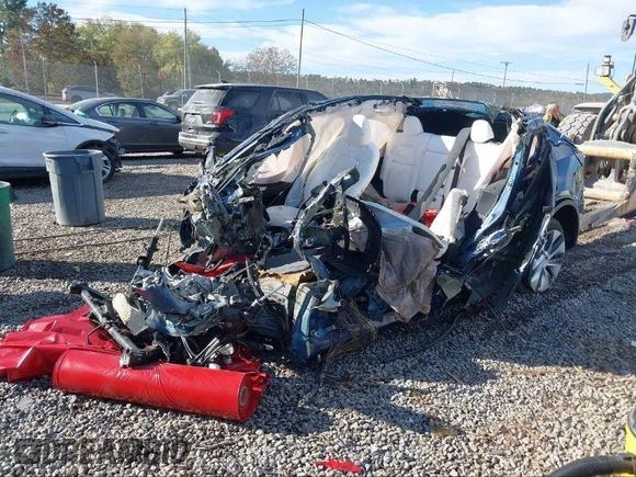 2024 Tesla Model Y Long Range with VIN 7SAYGDEEXRA265159, listed as a IAAI auction lot 40907008 with Not Provided miles and . Bid and sale history available at DreamBid. Image 2.