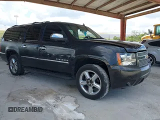2011 Chevrolet Suburban LTZ z VIN 1GNSKKE3XBR180241, wystawiony jako IAAI lot #42365771 z przebiegiem 231 477 mil mil oraz . Historia ofert i sprzedaży dostępna na DreamBid. Obrazek 1.