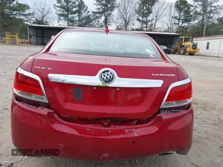 2013 Buick LaCrosse Touring z VIN 1G4GJ5E30DF289424, wystawiony jako IAAI lot #41248367 z przebiegiem 119 732 mil mil oraz . Historia ofert i sprzedaży dostępna na DreamBid. Obrazek 16.