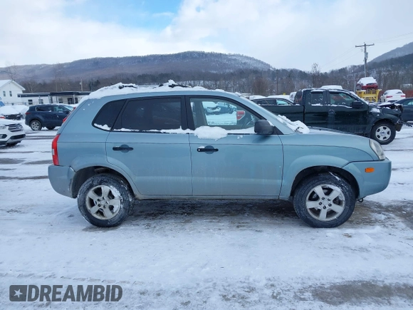 2006 Hyundai Tucson GL with VIN KM8JM72B06U298904, listed as a IAAI auction lot 41370728 with 209,284 mi miles. Bid and sale history available at carsss.com. Image 13.
