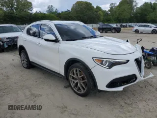 2018 Alfa Romeo Stelvio z VIN ZASFAKAN3J7B89286, wystawiony jako Copart lot #55717365 z przebiegiem 81 672 mil mil oraz Szkoda całkowita • Salvage title. Historia ofert i sprzedaży dostępna na DreamBid. Obrazek 4.