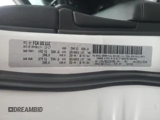 2018 Jeep Grand Cherokee Limited с VIN 1C4RJFBG8JC257599, выставлен на аукционе Copart как лот 82498624 с пробегом 76 437 миль миль и Списание • Salvage title. История ставок и продаж доступна на DreamBid. Изображение 14.