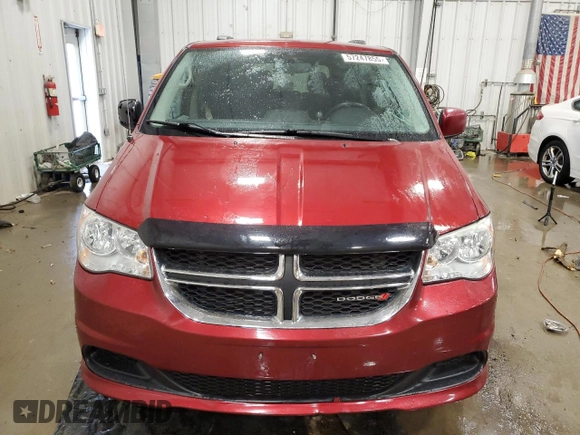 2014 Dodge Grand Caravan SXT z VIN 2C4RDGCG2ER239110, wystawiony jako Copart lot #57247855 z przebiegiem 94 126 mil mil oraz Nie do naprawy. Historia ofert i sprzedaży dostępna na DreamBid. Obrazek 5.