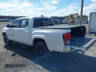 2020 Toyota Tacoma SR5 with VIN 3TMCZ5AN5LM339977, listed as a IAAI auction lot 41886937 with 94,986 mi miles and . Bid and sale history available at DreamBid. Image 3.