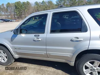 2005 Ford Escape Hybrid with VIN 1FMCU95H45KD16867, listed as a IAAI auction lot 41661311 with 206,698 mi miles. Bid and sale history available at carsss.com. Image 14.
