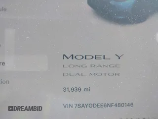 2022 Tesla Model Y Long Range with VIN 7SAYGDEE6NF480146, listed as a IAAI auction lot 41906361 with 31,939 mi miles and . Bid and sale history available at carsss.com. Image 7.