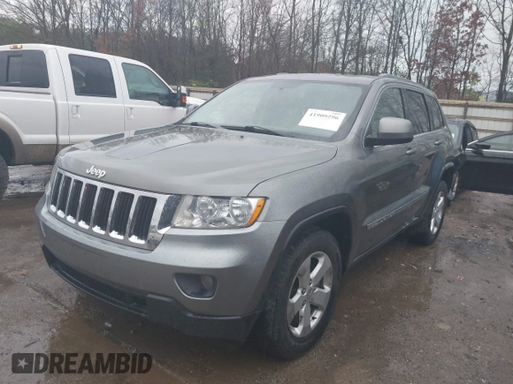 2012 Jeep Grand Cherokee Laredo with VIN 1C4RJFAG0CC156545, listed as a IAAI auction lot 41909296 with 170,033 mi miles. Bid and sale history available at carsss.com. Image 2.