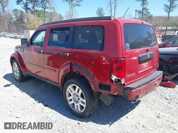 2010 Dodge Nitro SE with VIN 1D4PT2GK7AW142856, listed as a IAAI auction lot 41855687 with 197,248 mi miles. Bid and sale history available at carsss.com. Image 3.