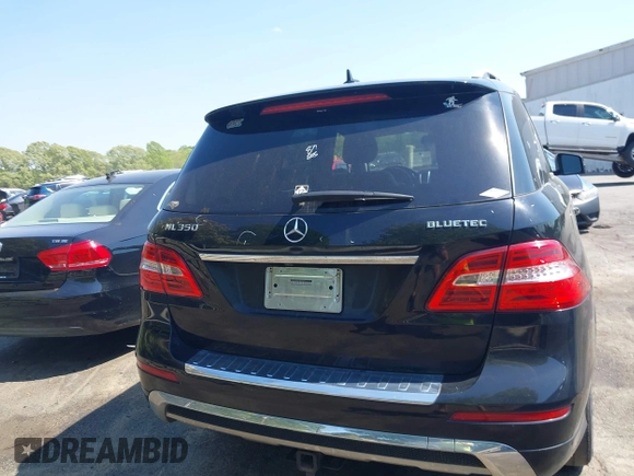 2014 Mercedes-Benz M 350 z VIN 4JGDA2EB0EA385223, wystawiony jako IAAI lot #42056714 z przebiegiem 185 750 mil mil oraz . Historia ofert i sprzedaży dostępna na DreamBid. Obrazek 16.