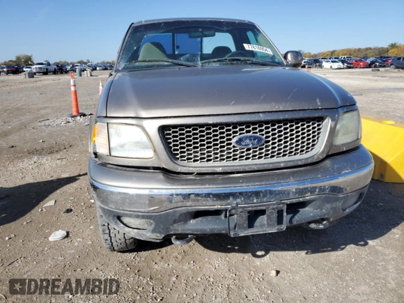 2001 Ford F-150 XL with VIN 1FTRF18W71NB69621, listed as a Copart auction lot 77816954 with Not provided miles and Salvage title. Bid and sale history available at DreamBid. Image 5.