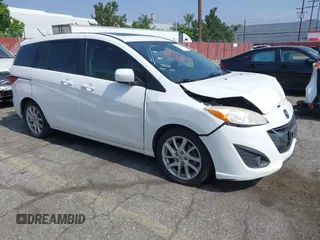 2012 Mazda 5 Touring with VIN JM1CW2CL2C0125776, listed as a IAAI auction lot 42496258 with 130,522 mi miles and . Bid and sale history available at DreamBid. Image 1.