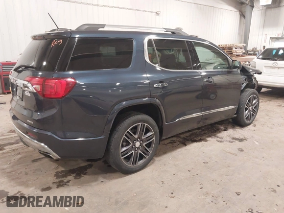 2018 GMC Acadia Denali with VIN 1GKKNXLS3JZ190894, listed as a IAAI auction lot 41312497 with 94,964 mi miles and . Bid and sale history available at DreamBid. Image 4.