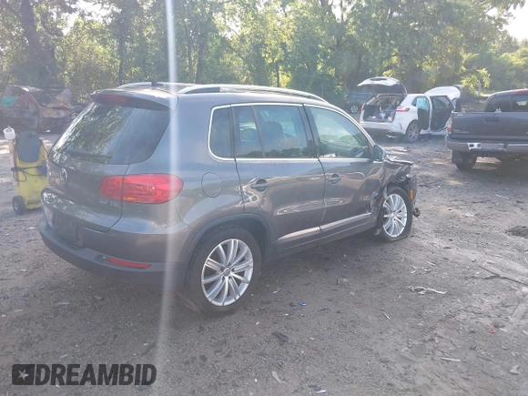 2013 Volkswagen Tiguan S with VIN WVGAV3AX7DW624136, listed as a IAAI auction lot 42256657 with 124,000 mi miles and . Bid and sale history available at DreamBid. Image 4.