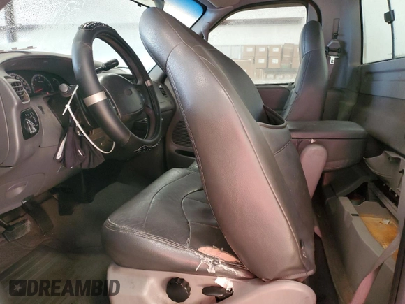 1999 Ford F-150 with VIN 1FTRF18W8XNB97257, listed as a Copart auction lot 87857815 with Not provided miles and Salvage title. Bid and sale history available at DreamBid. Image 7.