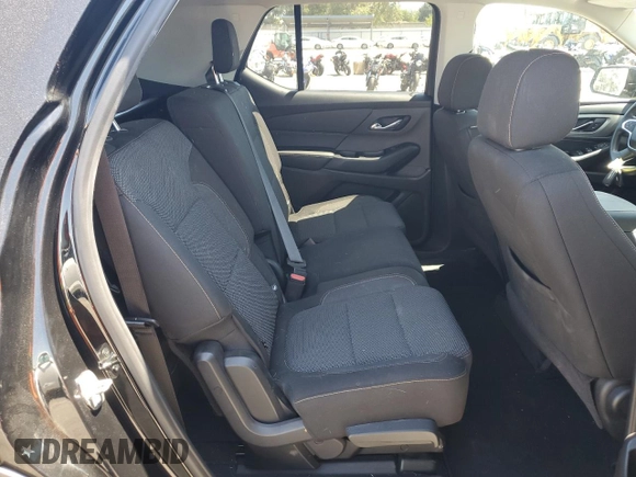 2018 Chevrolet Traverse LS z VIN 1GNERFKW5JJ255102, wystawiony jako Copart lot #56252255 z przebiegiem 82 385 mil mil oraz Szkoda całkowita • Salvage title. Historia ofert i sprzedaży dostępna na DreamBid. Obrazek 11.