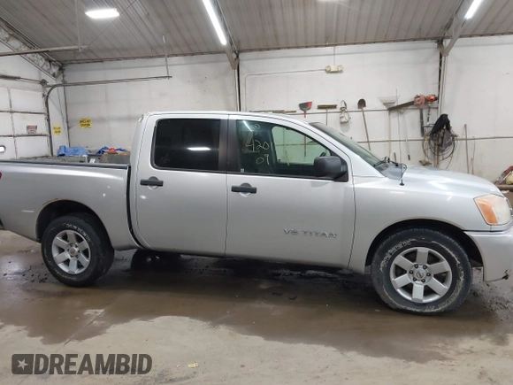 2009 Nissan Titan SE with VIN 1N6BA07D29N304233, listed as a IAAI auction lot 42013084 with 191,407 mi miles. Bid and sale history available at carsss.com. Image 13.
