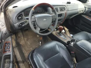2005 Ford Taurus SEL z VIN 1FAFP56S65A150519, wystawiony jako Copart lot #54002315 z przebiegiem Nie podano mil oraz Szkoda całkowita • Salvage title. Historia ofert i sprzedaży dostępna na DreamBid. Obrazek 8.
