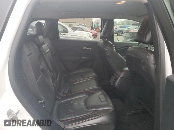 2015 Jeep Cherokee Trailhawk z VIN 1C4PJMBS9FW698857, wystawiony jako Copart lot #86572504 z przebiegiem 143 919 mil mil oraz Czysty tytuł • Clean title. Historia ofert i sprzedaży dostępna na DreamBid. Obrazek 10.