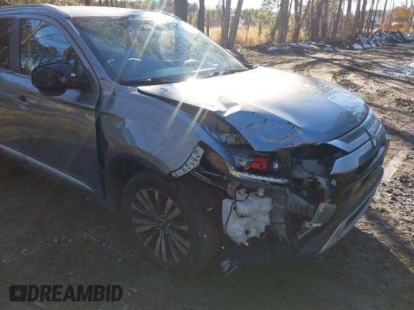 2020 Mitsubishi Outlander ES with VIN JA4AZ3A31LZ041204, listed as a IAAI auction lot 41265645 with 98,372 mi miles and . Bid and sale history available at DreamBid. Image 6.