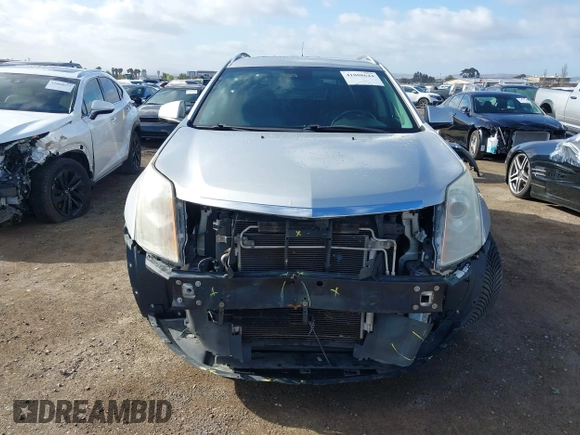 2014 Cadillac SRX Performance Collection with VIN 3GYFNCE39ES544135, listed as a IAAI auction lot 41808644 with 145,772 mi miles and . Bid and sale history available at carsss.com. Image 6.