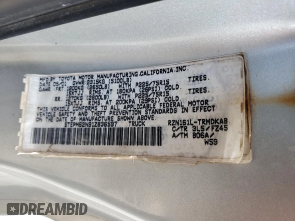 2001 Toyota Tacoma z VIN 5TEPM62N91Z836597, wystawiony jako Copart lot #53106165 z przebiegiem 263 107 mil mil oraz Szkoda całkowita • Salvage title. Historia ofert i sprzedaży dostępna na DreamBid. Obrazek 12.